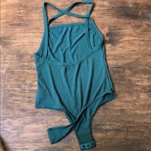 Cross back body suit